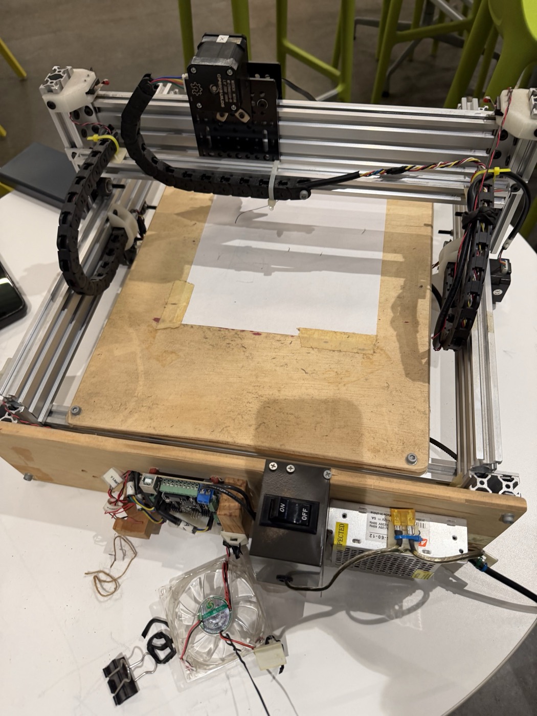 The aluminium extrusion rail frame on its plywood base, controller and power supply at the bottom